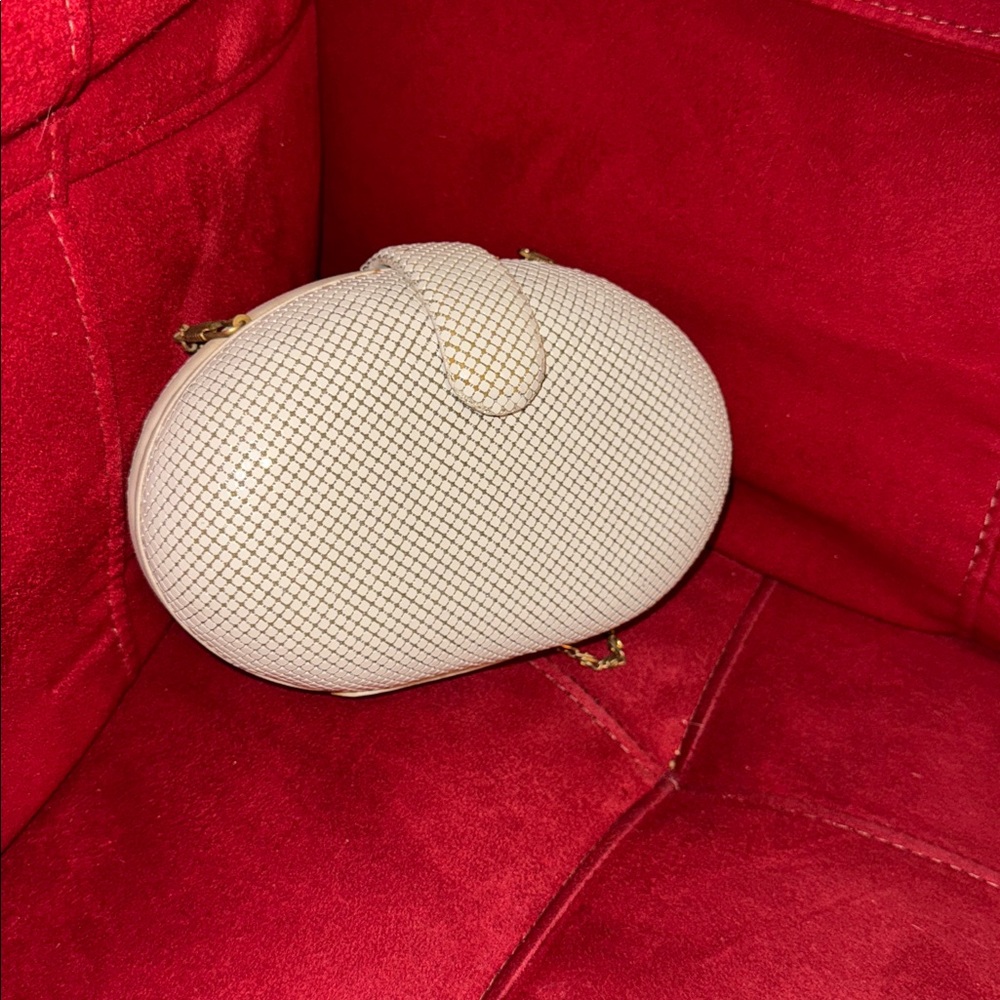 Whiting and Davis Elegant Cream Clutch with Gold Chain
